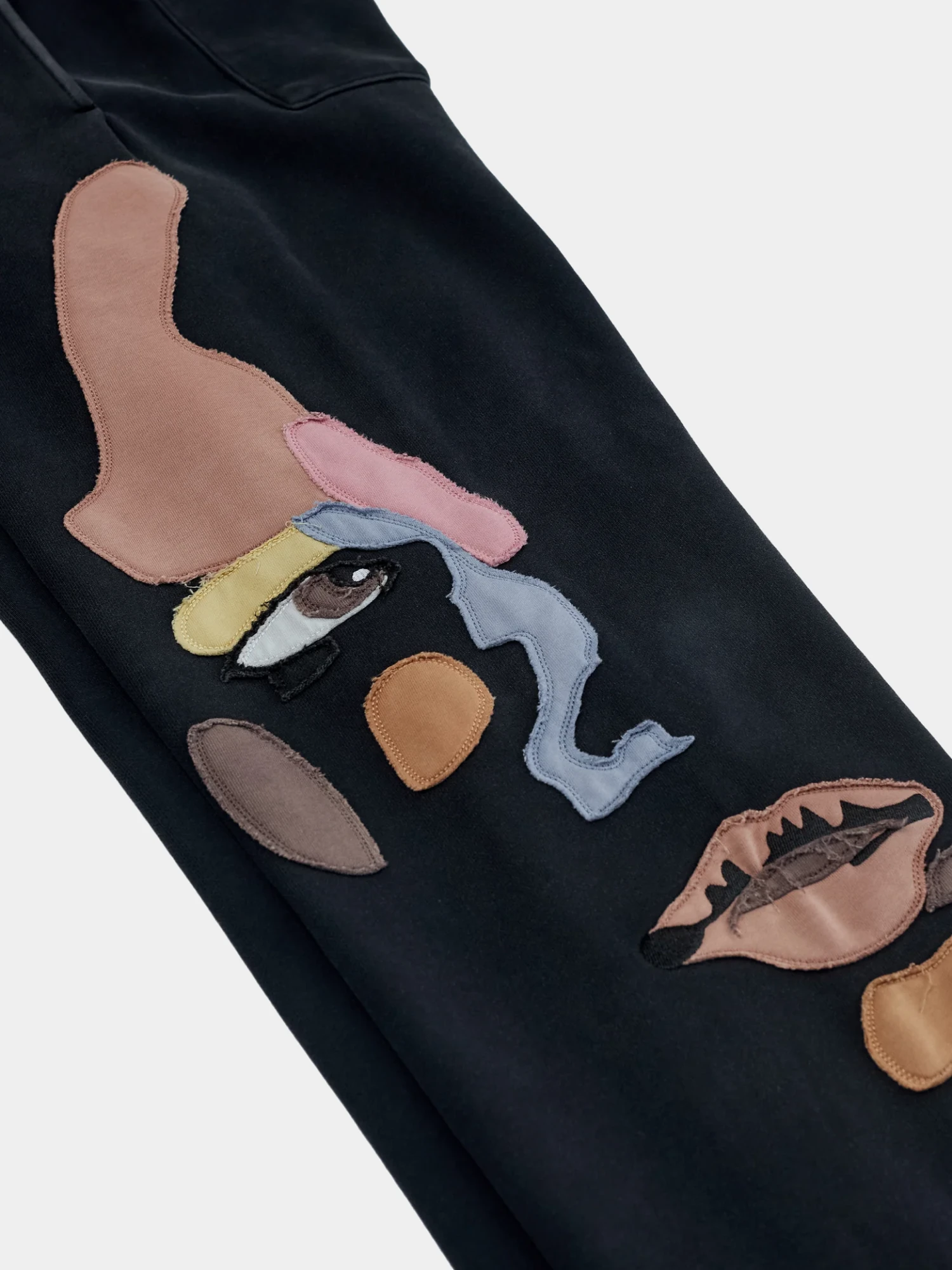 Брюки KidSuper Side Eye Face Black