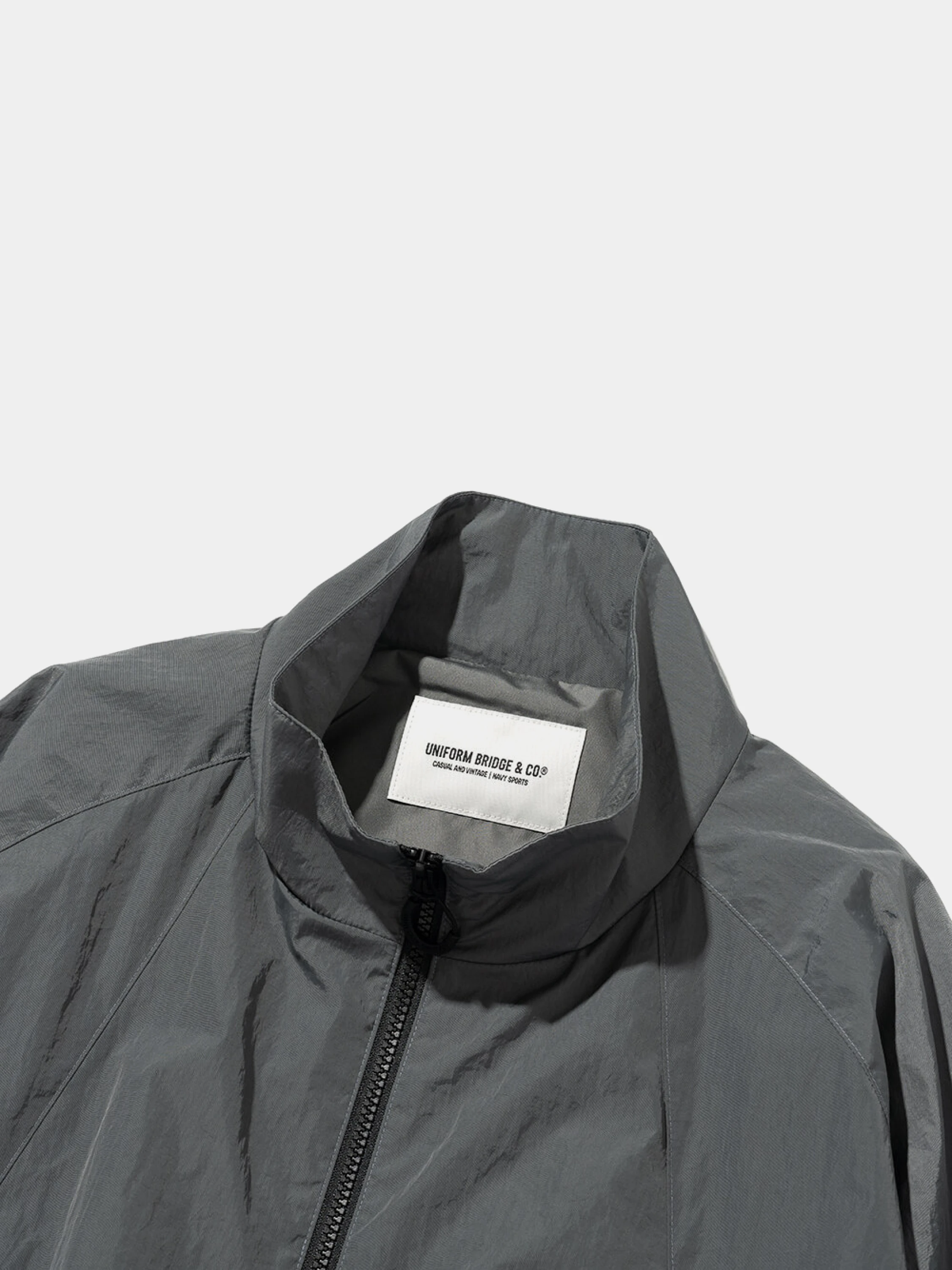 Ветровка Uniform Bridge Training Wind Jacket Grey