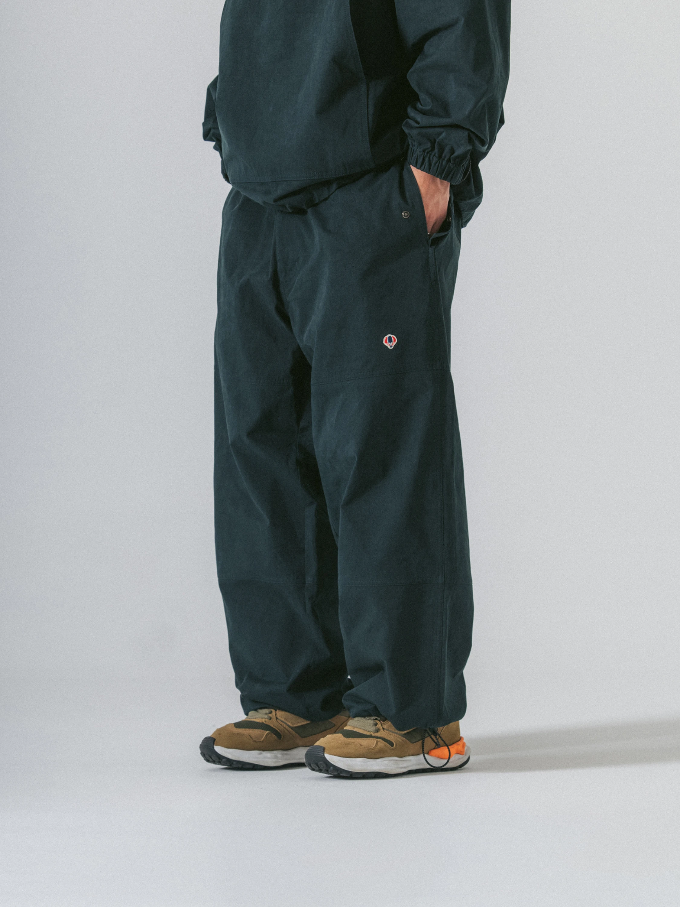 Брюки ANGLAN Advance Wappen String Panel Pants Forest Green